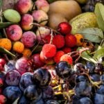 a close up of a bunch of fruit on a table